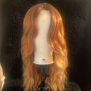 Reddish blonde ,long ,wavy lace frontal wig never worn